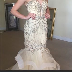 Copy photo: Reposhing this beautiful Jovani ball gown I did not get to use.